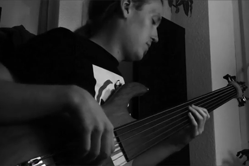Johannes Zetterberg laying down fretless bass Johannes Zetterberg laying down fretless bass